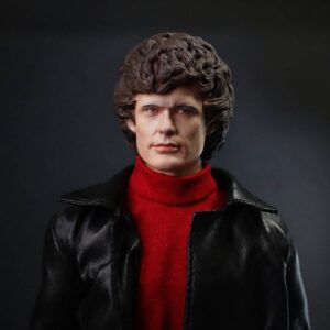 1/6 scale painted head sculpt of a Michael Knight–inspired character (David Hasselhoff likeness), featuring sculpted curly hair, red turtleneck and black leather jacket, studio lighting with shallow depth of field.